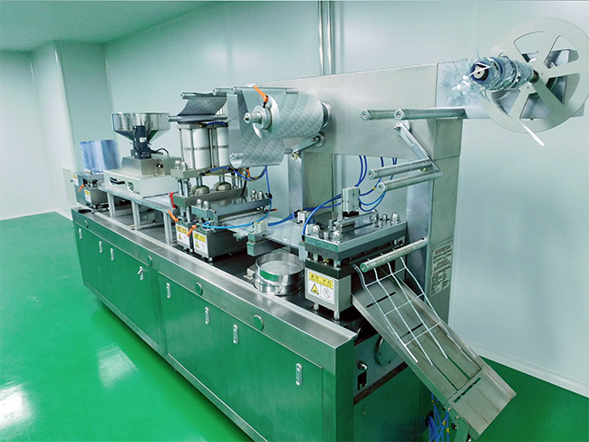 Aluminum plastic packaging machine